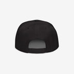 No Kings No Masters Hat features a rear view highlighting its adjustable snap-back closure and six-panel construction, embodying rebellious style and defiance.