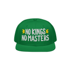 Green flat-brim cap with NO KINGS NO MASTERS slogan and yellow crown icons. This No Kings No Masters Hat embodies rebellious 