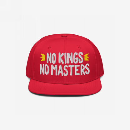 No Kings No Masters Hat: A red snapback baseball cap with bold white embroidery stating “NO KINGS NO MASTERS,” accented by yellow crown icons, symbolizing rebellion and individuality.