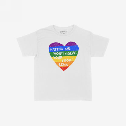 No LGBTQ Hate Women's Baby Tee features a distressed rainbow heart with the phrase “Hating Me Won’t Solve Your Problems,” showcasing trans pride and resistance. Brand name faintly visible in collar.
