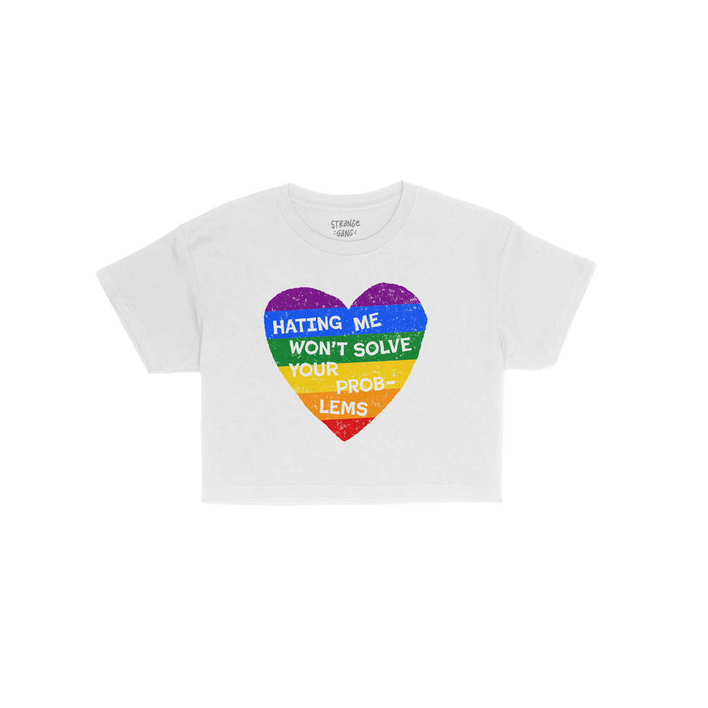 No LGBTQ Hate Women's Baby Tee features a distressed rainbow heart with the phrase “Hating Me Won’t Solve Your Problems,�