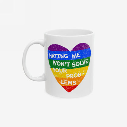 The No LGBTQ Hate Mug features a textured rainbow heart with the phrase Hating Me Won’t Solve Your Problems, embodying pride and resilience in a durable ceramic form.