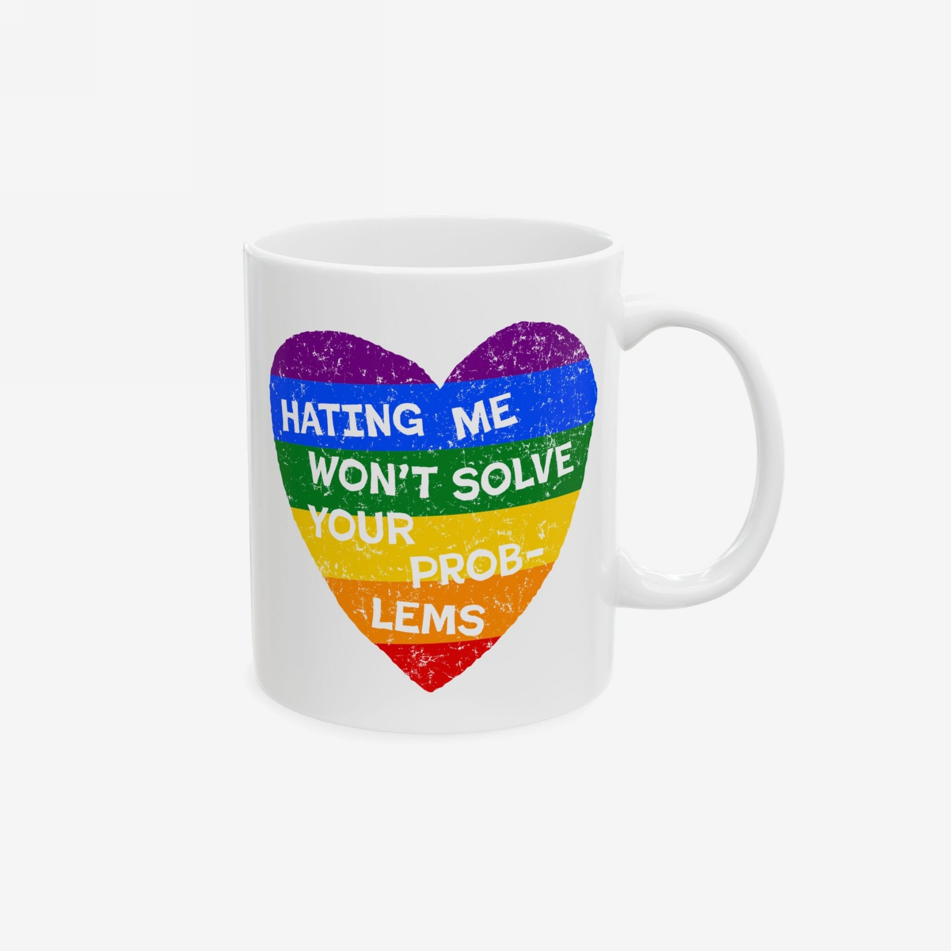 No LGBTQ Hate Mug featuring a distressed rainbow heart and bold message: “HATING ME WON’T SOLVE YOUR PROB-LEMS.” A vibrant statement piece supporting equality and LGBTQ+ pride.