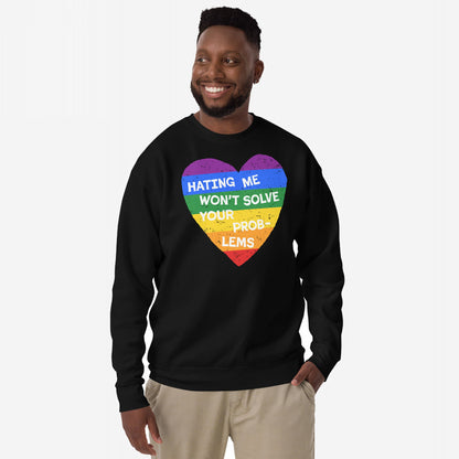 Man wearing the No LGBTQ Hate Hoodie & Sweatshirt with a rainbow-striped heart and bold text, HATING ME WON'T SOLVE YOUR PROBLEMS, embodying pride and resistance.