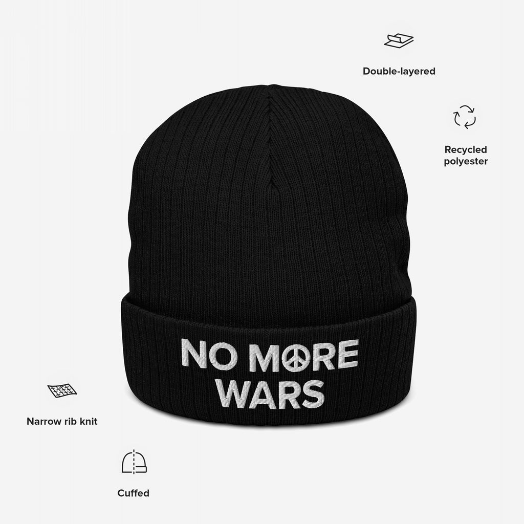 No More Wars Hat: Black cuffed beanie with NO M☮RE WARS slogan embroidered in white, featuring double-layered recycled polyester, narrow rib knit, highlighting peace advocacy and anti-war stance.