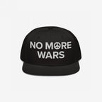 The No More Wars Hat features bold white embroidery with a peace-sign symbol, advocating against war. Ideal for protests or daily wear, it embodies a powerful message of peace and resistance.