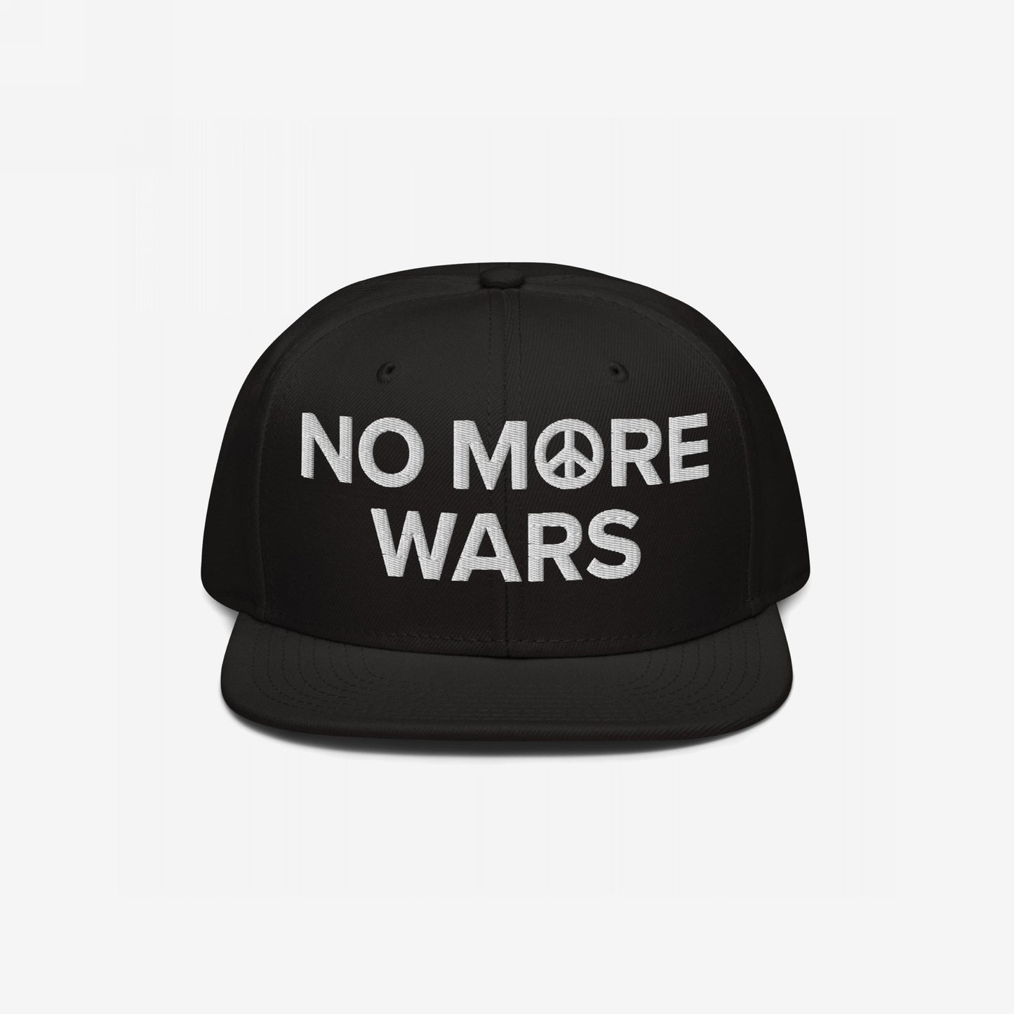 No More Wars Hat: A black snapback cap featuring “NO MORE WARS” embroidered in white with a peace-symbol icon, promoting anti-war sentiments, suitable for activism and everyday wear.
