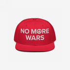 No More Wars Hat featuring bold white embroidery with peace symbolism, promoting anti-war sentiment. Ideal for protests or daily wear, aligning with themes of activism and peace advocacy.