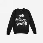 Black crew-neck sweatshirt featuring NO MORE WARS in white, graffiti-style lettering with a peace symbol. The No More Wars Shirt advocates for peace and accountability. Brand label visible inside the collar.