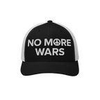 No More Wars Hat features a black-and-white trucker style with NO MORE WARS embroidered, using a peace symbol for the O, symb