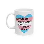 No Trans Hate Mug featuring a distressed-style heart with transgender pride colors and the slogan HATING ME WON’T SOLVE YOU