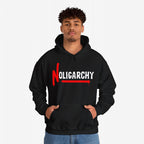 Person wearing the No Oligarchy Shirt, a black hoodie with bold NOLIGARCHY text on the front. The design reflects dissent against the elite, aligning with themes of activism and equality.