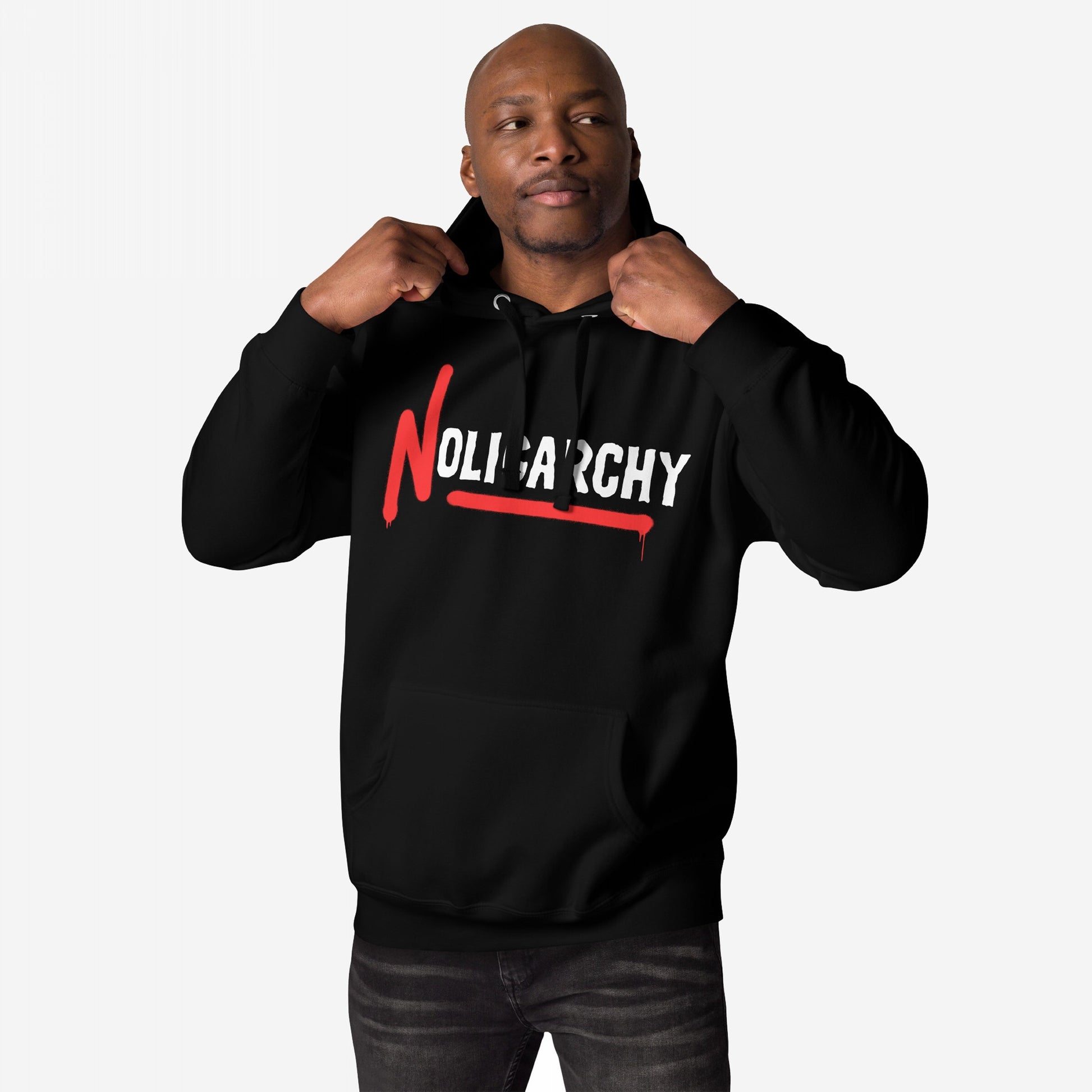 Model wearing the No Oligarchy Hoodie, featuring bold NOLIPARCHY text with a striking red N and underline. The design embodies rebellion and activism, ideal for those championing equality and justice.