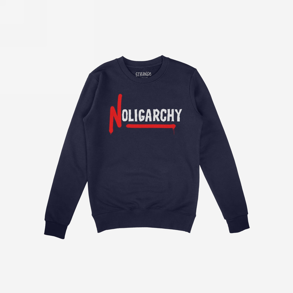 No Oligarchy Shirt, a navy-blue crewneck sweatshirt featuring bold NOLIGARCHY text in a rebellious graffiti style. Perfect for those challenging the elite, aligning with artful activism against inequality.
