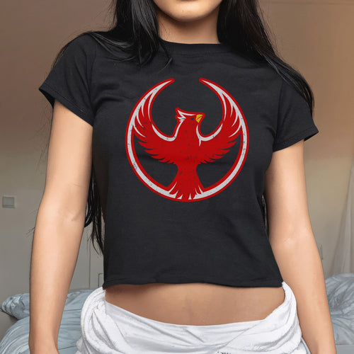 St. Louis Rebel Alliance Women's Baby Tee features a black crop top with a distressed red phoenix encircled, symbolizing resilience and equality, perfect for those advocating immigrant rights and social justice.