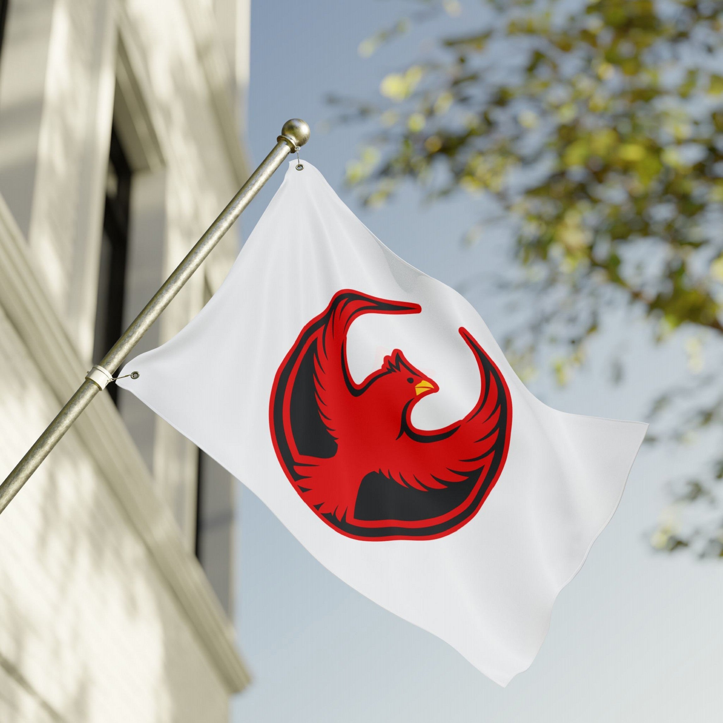 Northern Cardinal Rebel Alliance Flag on a metal pole, featuring a bold red cardinal with outstretched wings in a circular design, symbolizing protest against ICE and support for equality and immigrant rights.