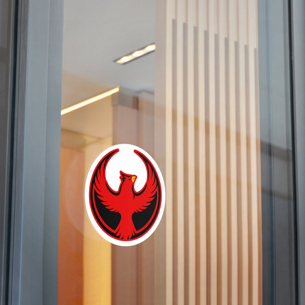 Northern Cardinal Rebel Alliance Sticker on glass door, featuring a red phoenix emblem with wings raised, symbolizing protest and identity, available in 3” x 3” or 5” x 5” sizes.