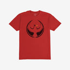 Northern Cardinal Rebel Alliance T-shirt featuring a distressed black firebird graphic with yellow beak, symbolizing protest and community defense, laid flat on a plain red background.