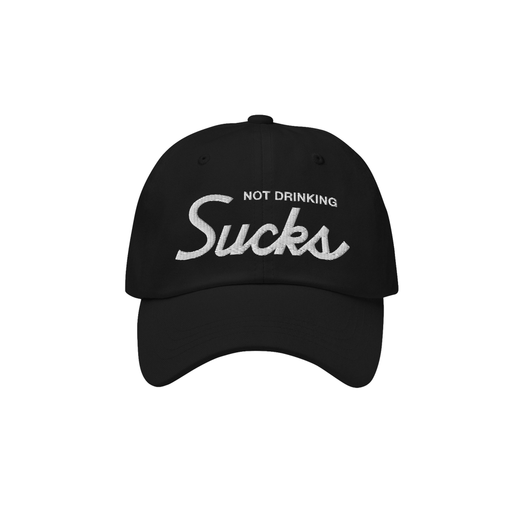 Not Drinking Sucks Hat features bold, white embroidered text on a black baseball cap, capturing a playful and honest party sp