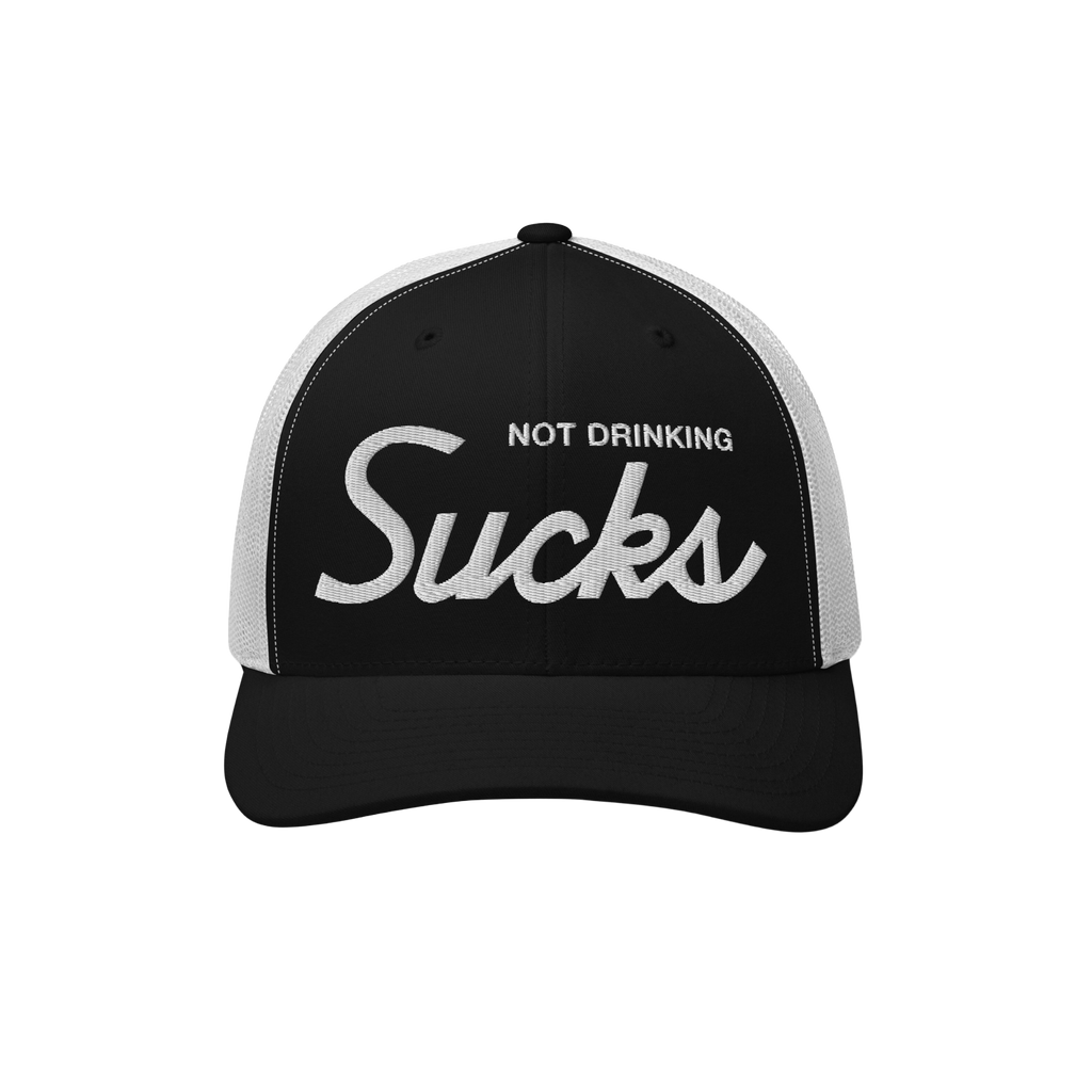 The Not Drinking Sucks Hat features a black front with bold “Not Drinking Sucks” embroidery. This playful trucker cap emb