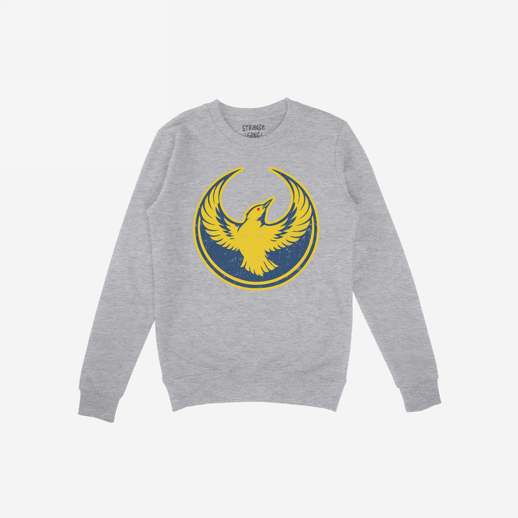 Light heather-gray Oregon Rebel Alliance Sweatshirt featuring a yellow bird graphic on a navy background, symbolizing protest and community support, with a lived-in, distressed finish.