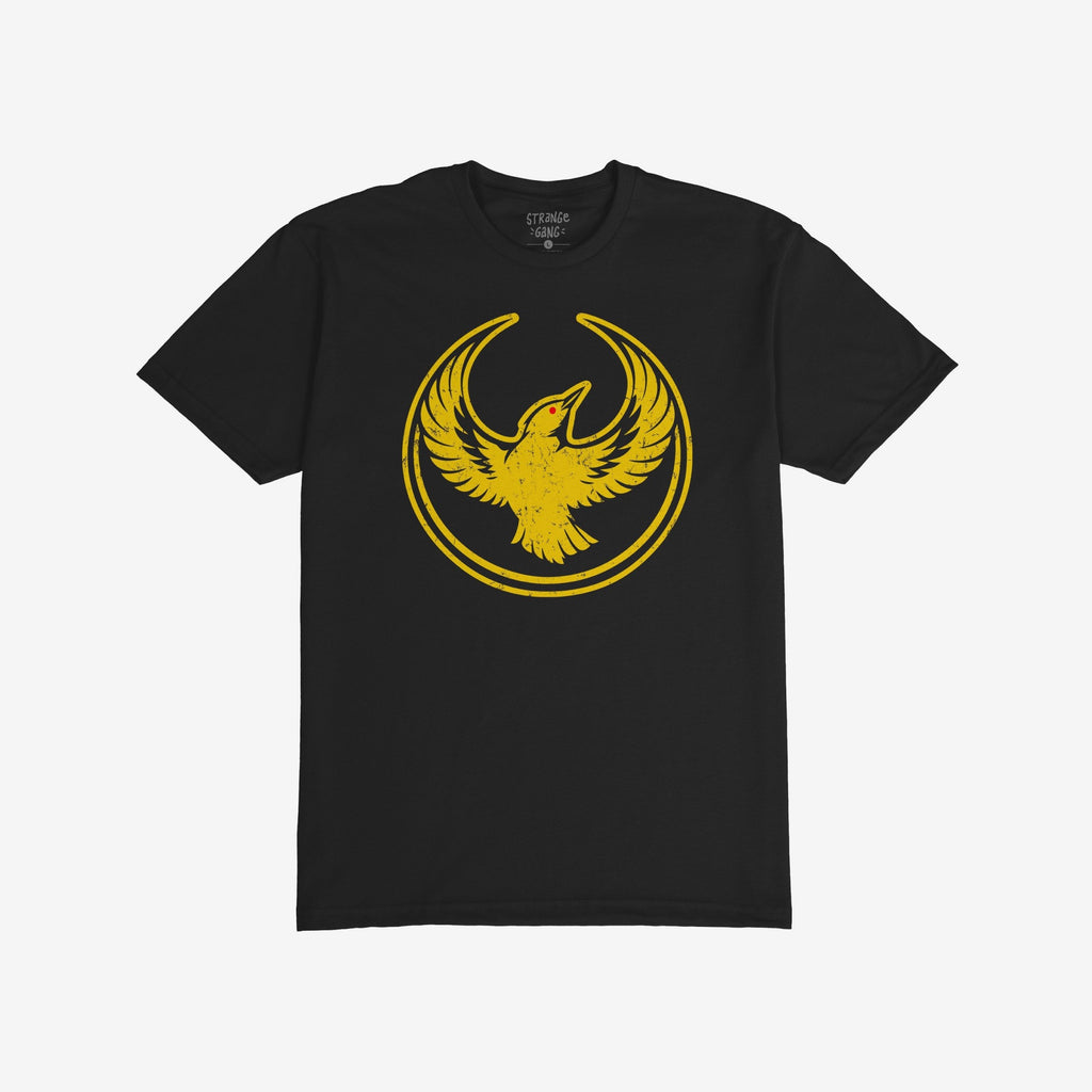 Oregon Rebel Alliance T-shirt featuring a distressed golden-yellow phoenix-like bird with red eye and circular border on the front. Neck label reads STRANGE GANG. Perfect for those supporting equality and justice.