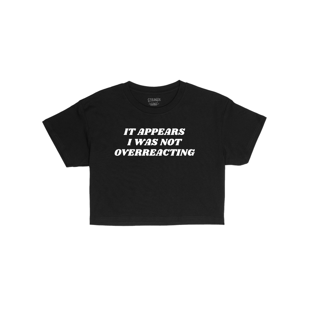 Overreacting Women's Baby Tee features bold white lettering stating, It appears I was not overreacting, on a black crew-neck.