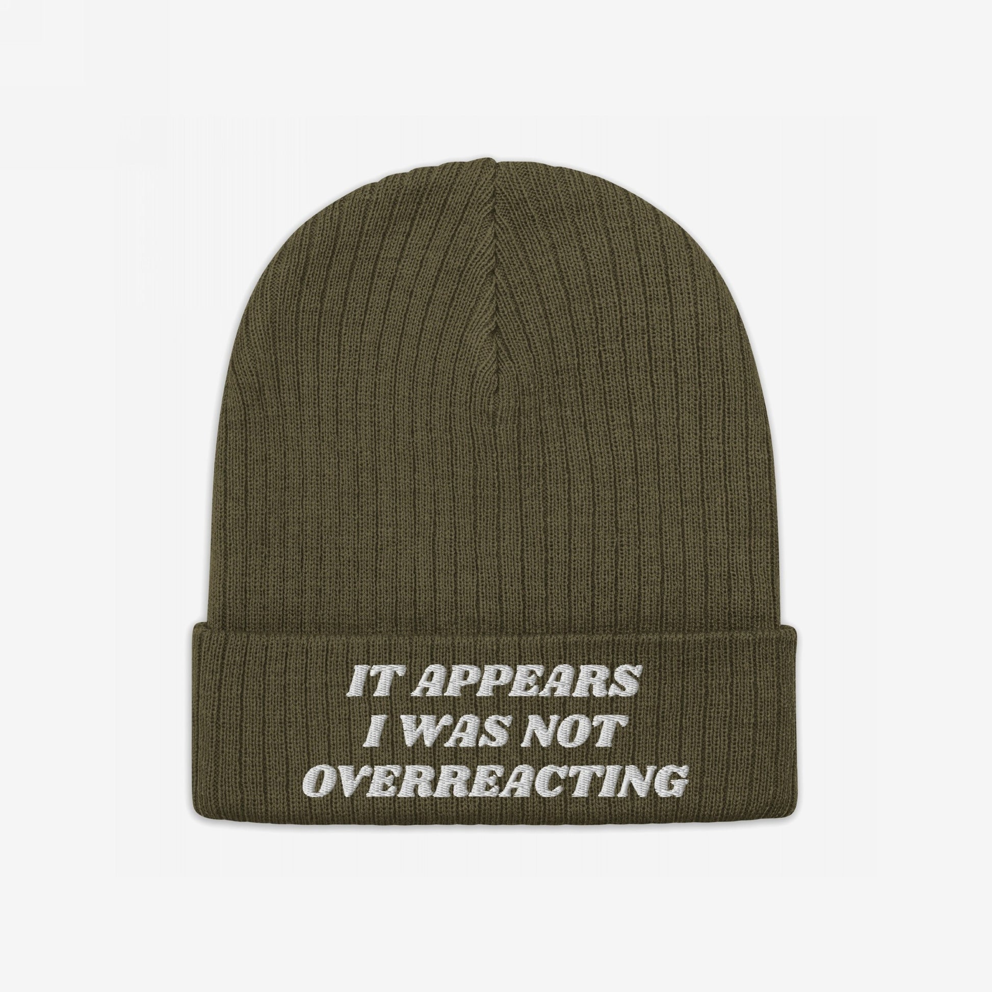 The No More Wars Hat features an olive-green knit beanie with a folded cuff, embroidered with the anti-war message “It appears I was not overreacting.” Perfect for protests and everyday wear.
