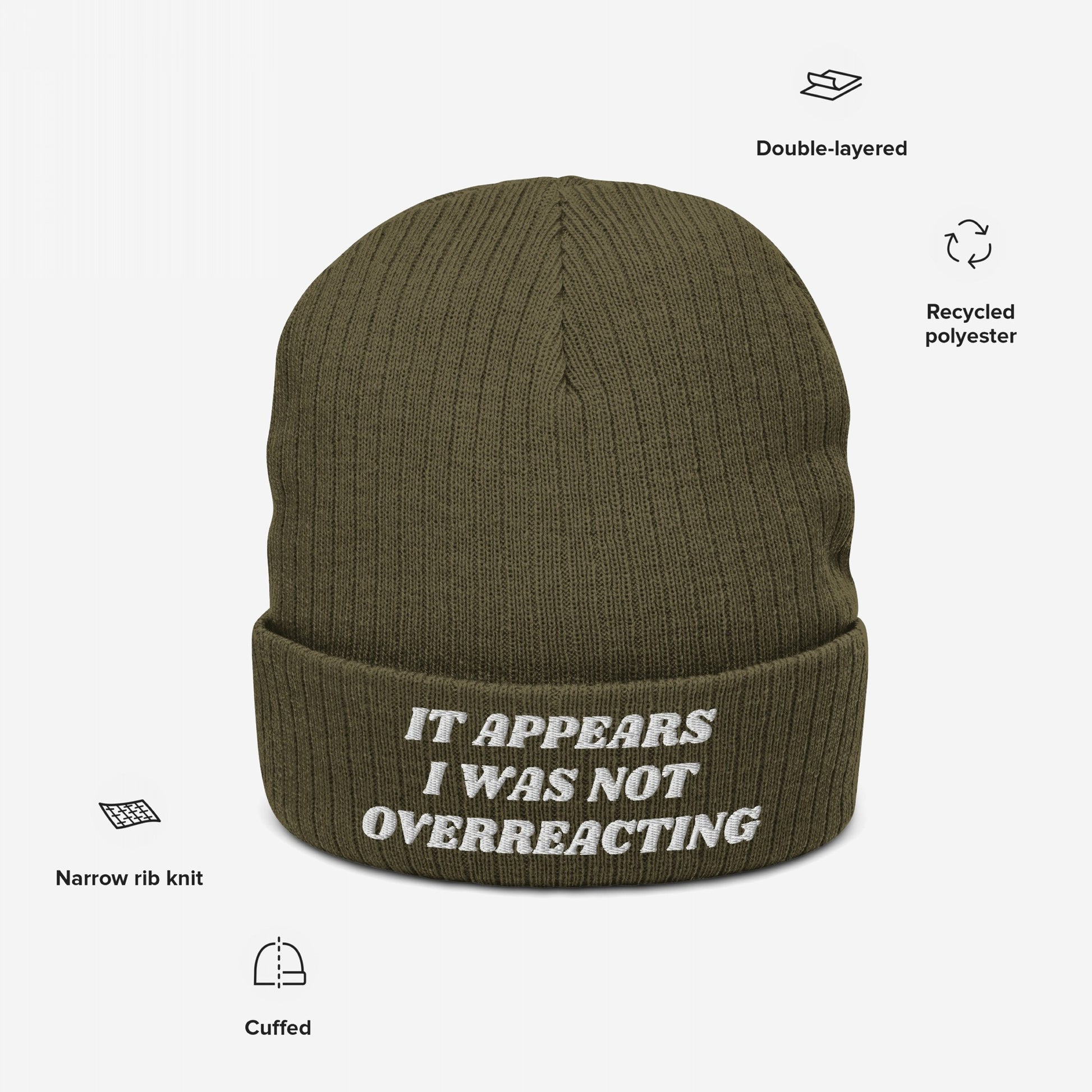 The No More Wars Hat is a dark olive-green, cuffed knit beanie with a white embroidered message, symbolizing anti-war sentiment. Features include double-layered recycled polyester and narrow rib-knit stitch.