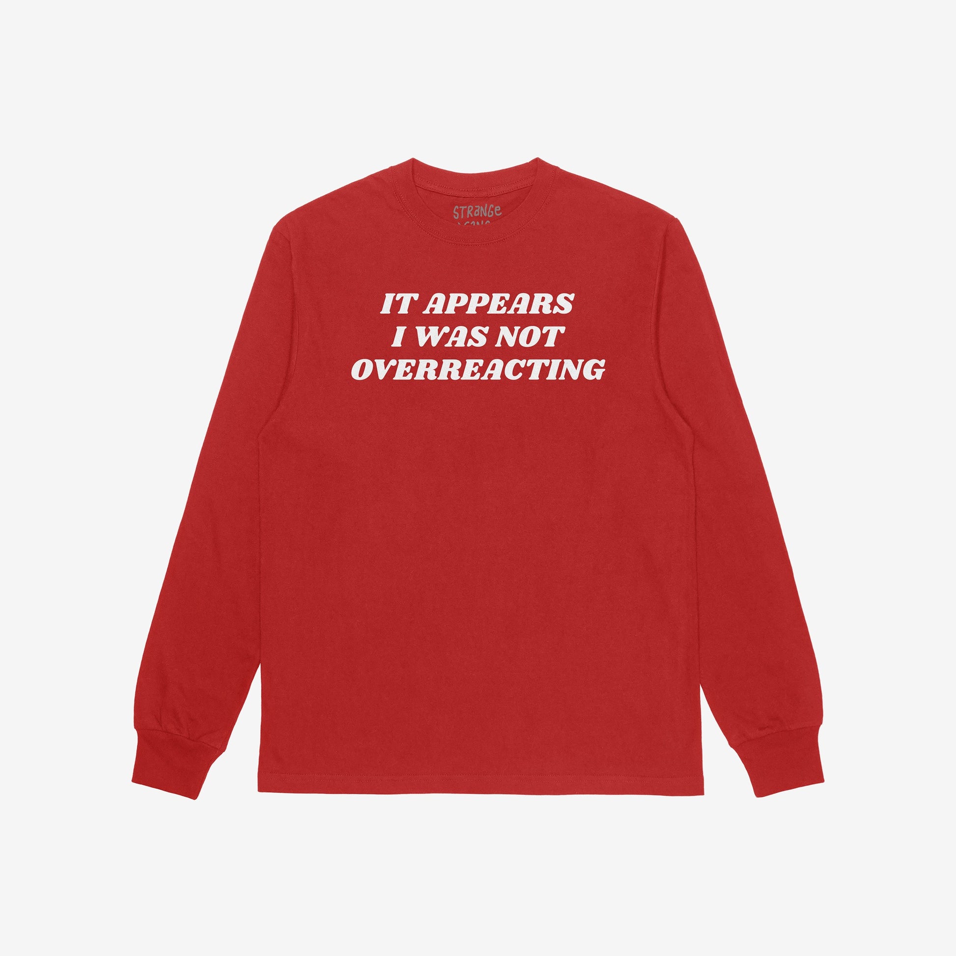Overreacting T-shirt featuring bold white text 'IT APPEARS I WAS NOT OVERREACTING' on a red crewneck, ideal for expressing unapologetic defiance and vindication. Available in men/unisex and kids sizes.