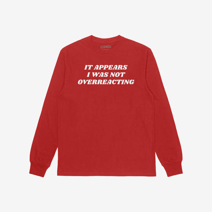 Overreacting T-shirt featuring bold white text 'IT APPEARS I WAS NOT OVERREACTING' on a red crewneck, ideal for expressing unapologetic defiance and vindication. Available in men/unisex and kids sizes.