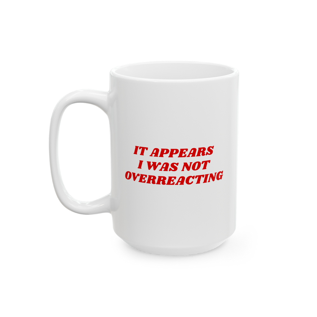 White ceramic mug with red text: IT APPEARS I WAS NOT OVERREACTING. The Overreacting Mug boldly communicates anti-fascist sen