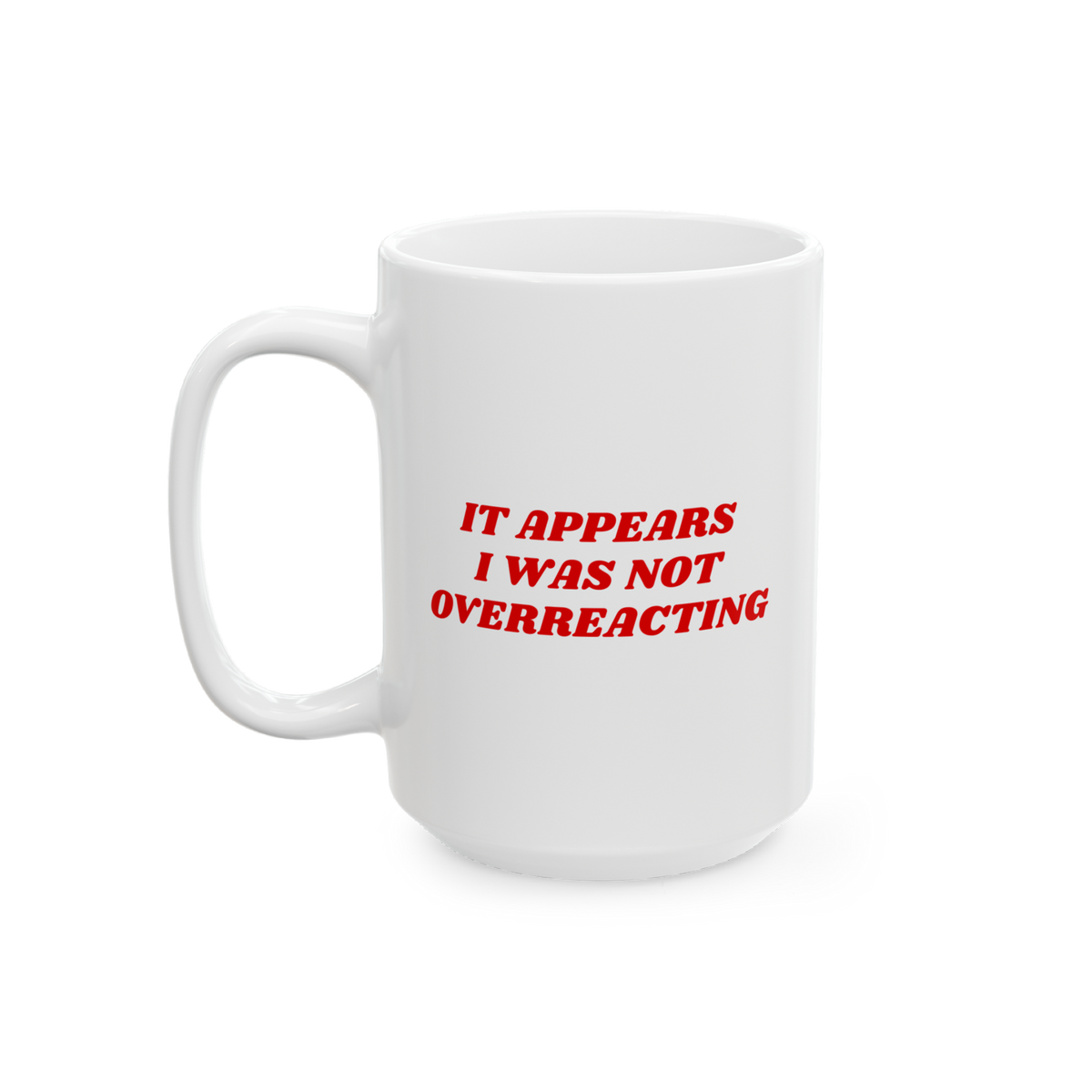 White ceramic mug with red text: IT APPEARS I WAS NOT OVERREACTING. The Overreacting Mug boldly communicates anti-fascist sen