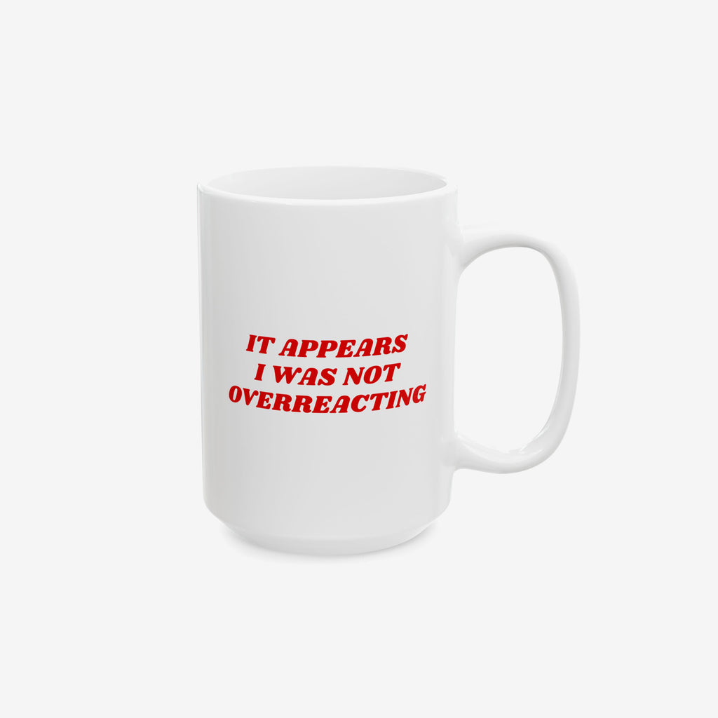 The Overreacting Mug, a white ceramic mug with a large handle, features bold red text declaring, IT APPEARS I WAS NOT OVERREACTING, embodying a strong anti-fascist message.
