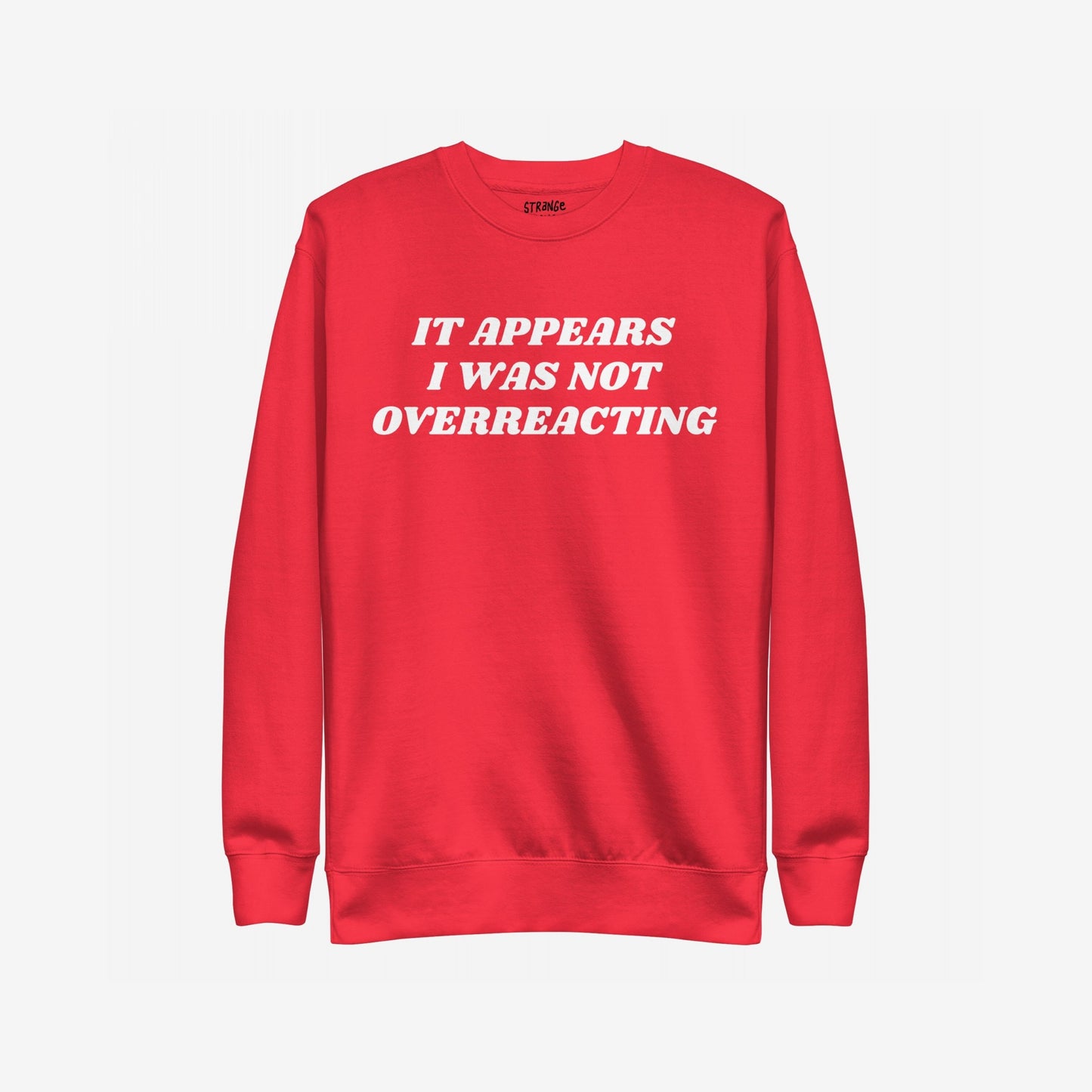 Overreacting Hoodie & Sweatshirt features bold white lettering stating, It appears I was not overreacting, conveying a strong message of resistance and empowerment against oppressive systems.