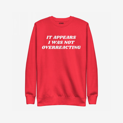 Overreacting Hoodie & Sweatshirt features bold white lettering stating, It appears I was not overreacting, conveying a strong message of resistance and empowerment against oppressive systems.