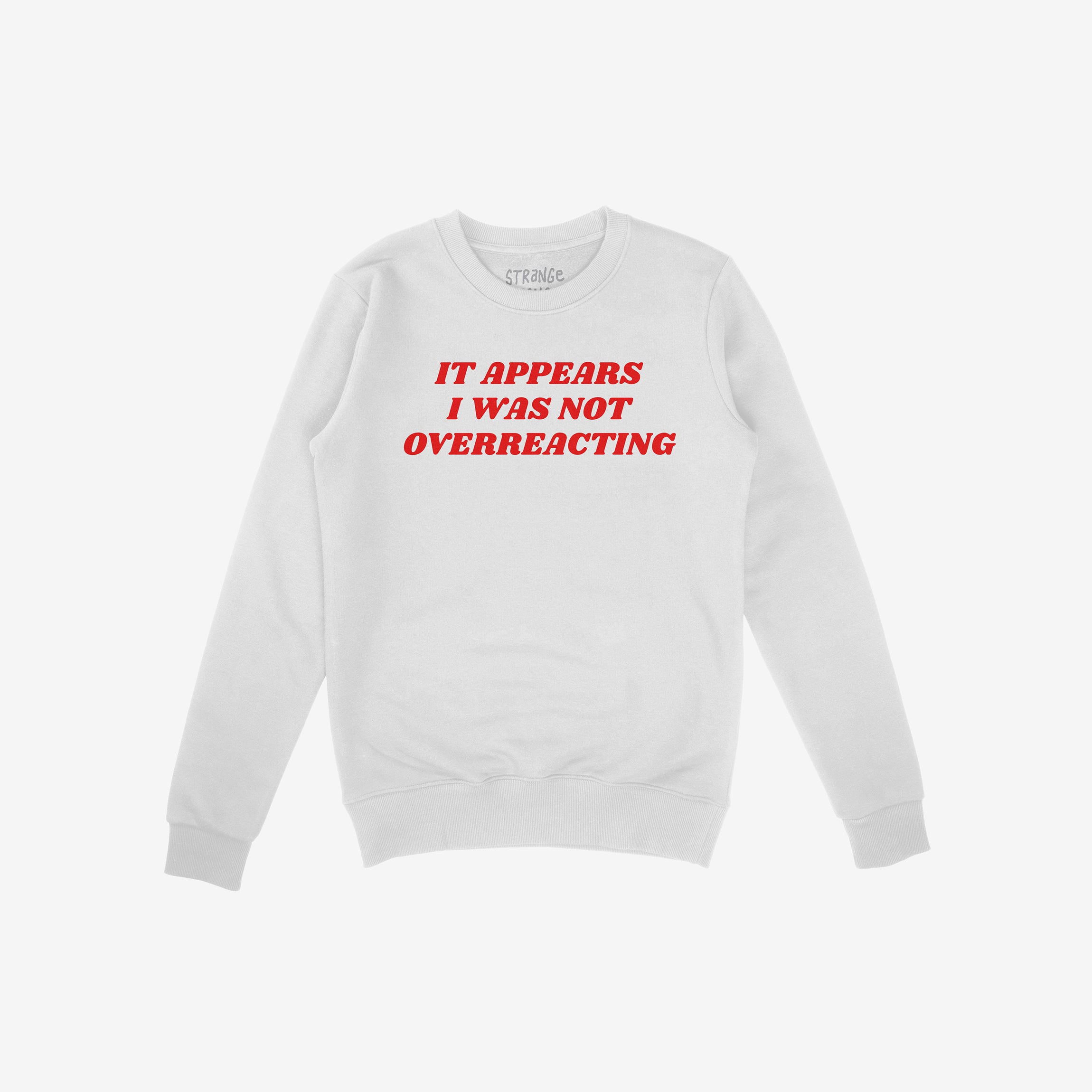 White crewneck sweatshirt featuring bold red text: IT APPEARS I WAS NOT OVERREACTING, embodying the Overreacting Shirt's anti-fascist message.