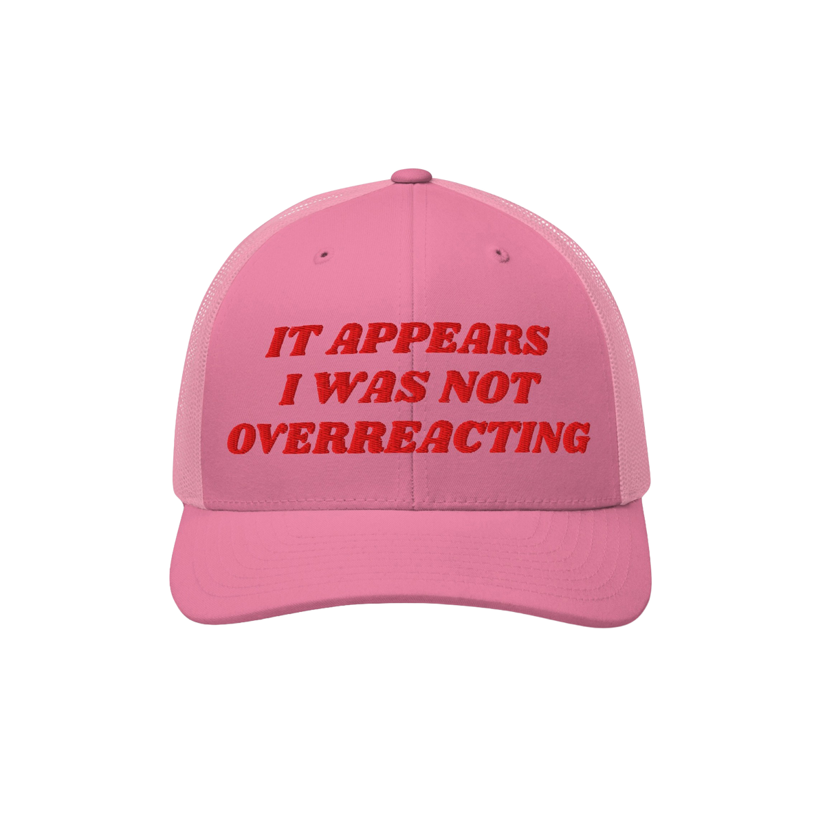 Pink trucker-style cap with red embroidered text: It Appears I Was Not Overreacting, symbolizing resistance against fascism a