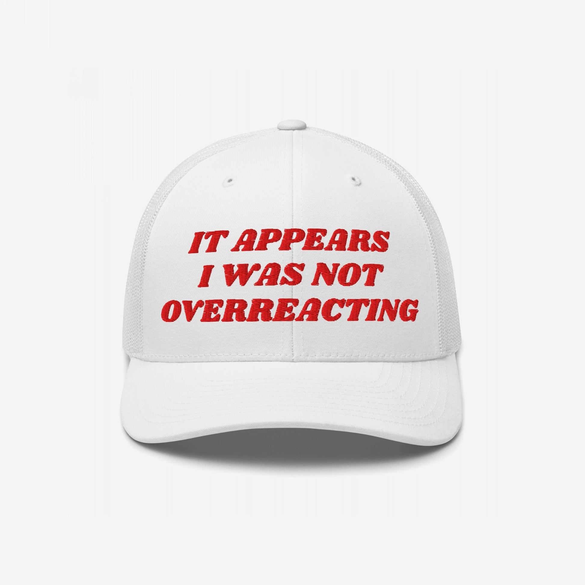 White mesh-back baseball cap with bold red embroidery reading “IT APPEARS I WAS NOT OVERREACTING,” embodying defiance against political gaslighting, perfect for activists and truth-tellers.