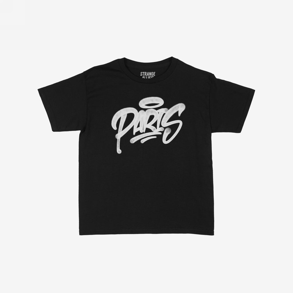 Paris Handstyle Women's Baby Tee features a bold white graffiti PARIS with a halo above the A on a black T-shirt, embodying edgy, artistic flair from Strange Allies.