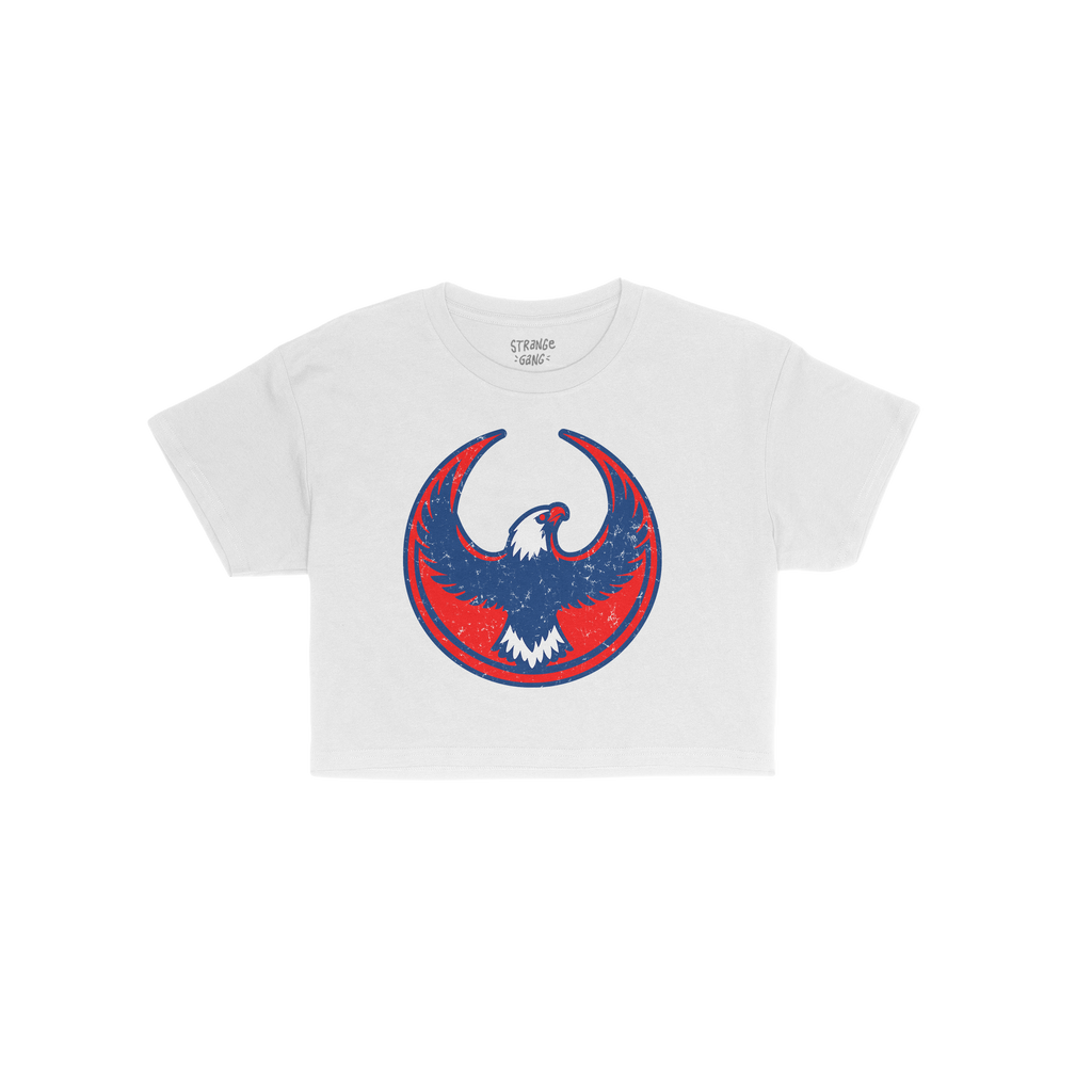 Philly Rebel Alliance Women's Baby Tee features a distressed eagle emblem in red and blue, symbolizing protest for immigrant 