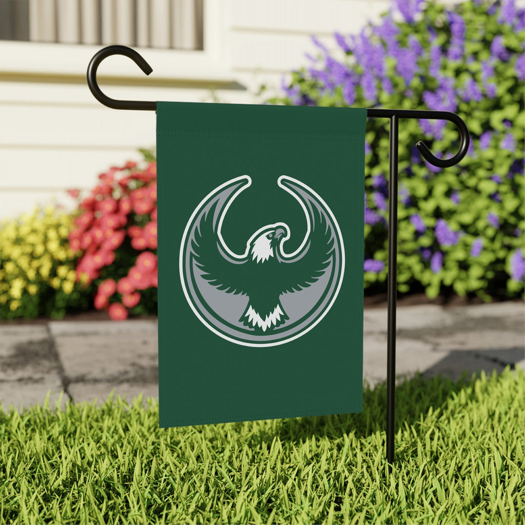 Philly Rebel Alliance Garden Flag features a bold eagle emblem in gray and white on deep green, symbolizing anti-fascist and immigrant rights advocacy, mounted on a simple black metal stake.