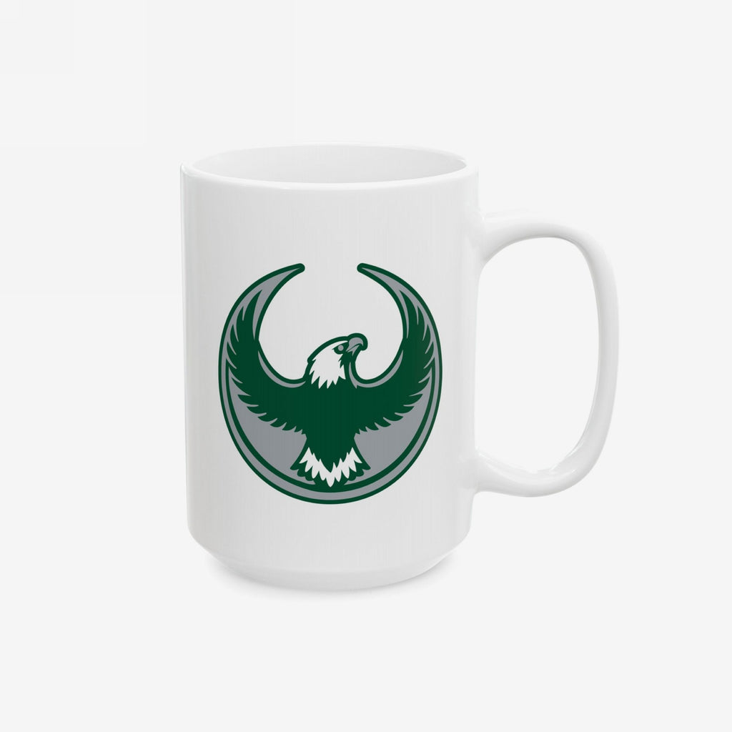 Philly Rebel Alliance Mug featuring a dark green stylized eagle emblem with outstretched wings, symbolizing anti-fascist protest. Dishwasher and microwave-safe, this white ceramic mug comes in 11 oz. or 15 oz. sizes.