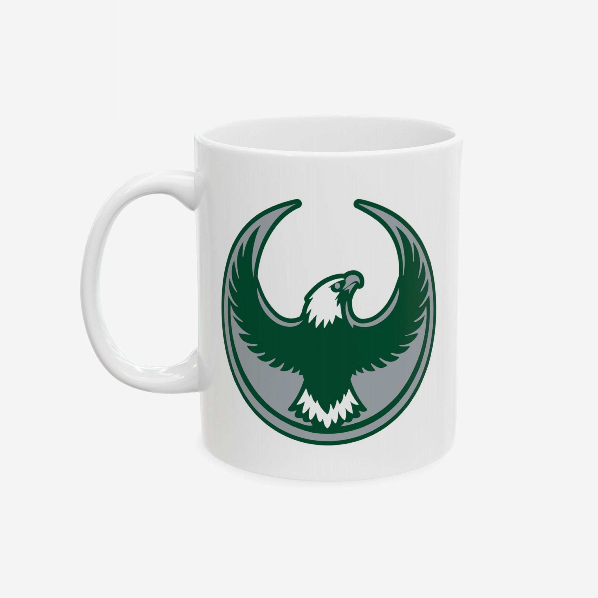 Philly Rebel Alliance Mug featuring a stylized eagle emblem in dark green, symbolizing resistance and solidarity, perfect for anti-fascist advocates. Available in 11 oz. and 15 oz. sizes, dishwasher and microwave safe.