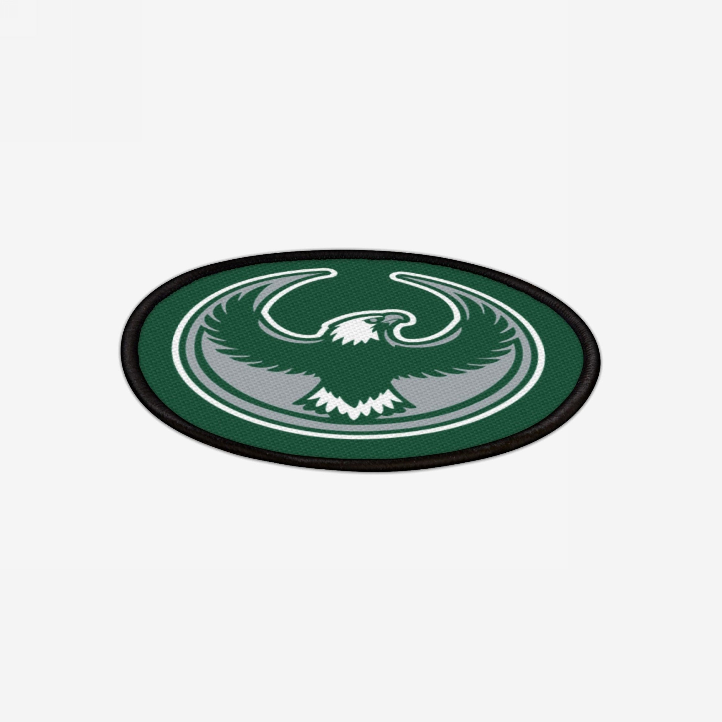 Philly Rebel Alliance Patch: An oval patch with a stylized eagle in flight on a dark green background, symbolizing anti-fascist protest and immigrant rights. Ideal for jackets, tote bags, or rally gear.