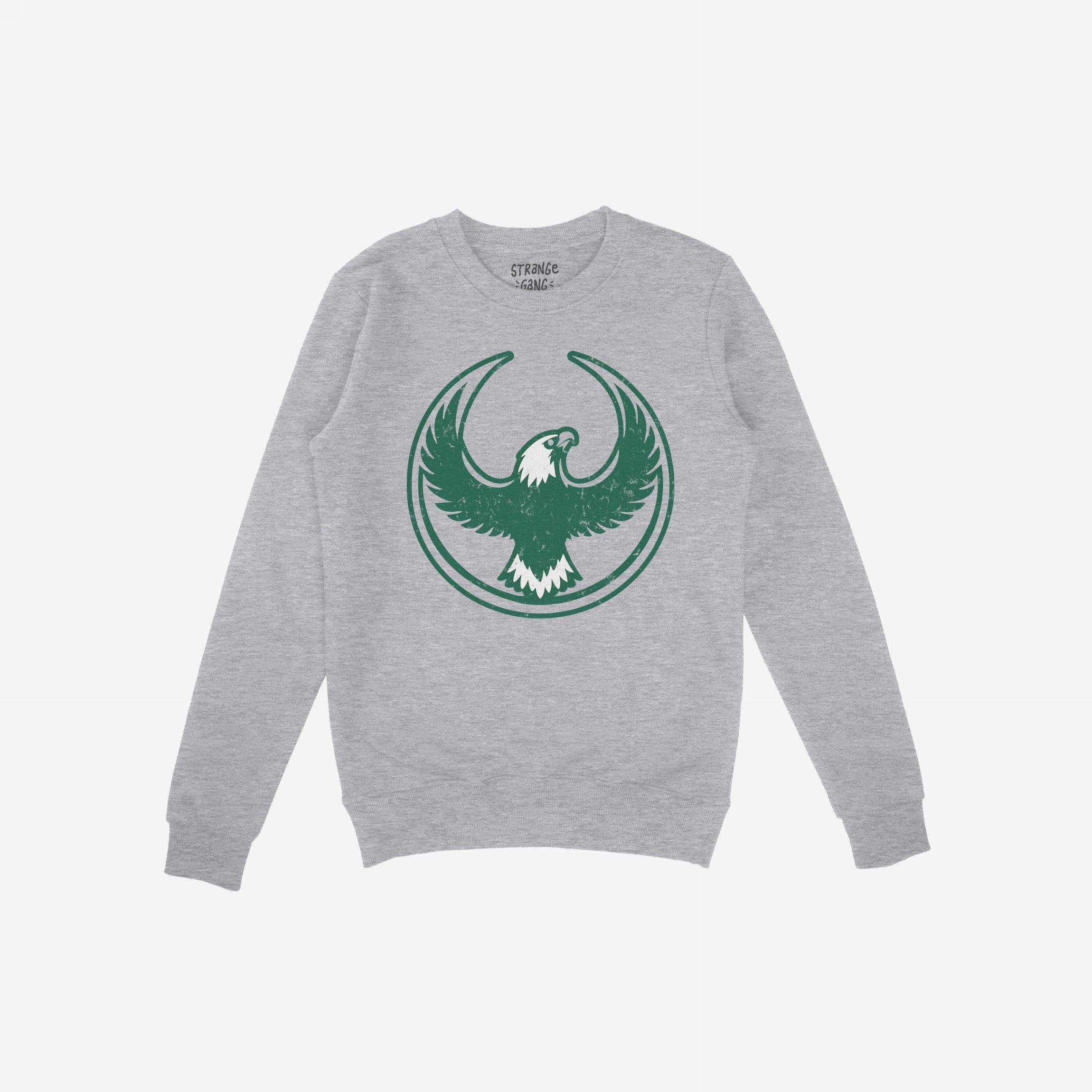 Light-gray crewneck sweatshirt featuring the Philly Rebel Alliance emblem: a bold, stylized eagle with outstretched wings encircled by rings, symbolizing anti-fascist and immigrant rights support.