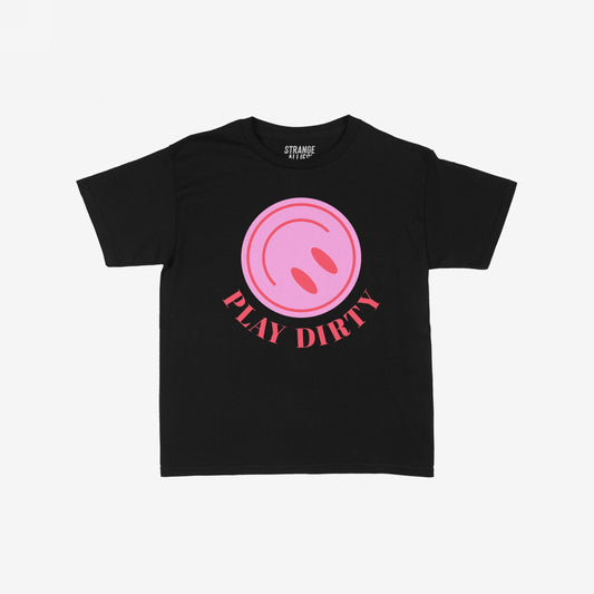 The Play Dirty Women's Baby Tee features a bold pink circle with red ovals and PLAY DIRTY in red, embodying a flirty, edgy style, perfect for making a statement.