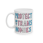 Protect My Trans Homies Mug with hand-drawn slogan in pink, white, and light blue. This ceramic mug champions transgender rig