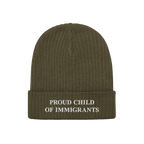 Proud Child Of Immigrants Hat: An olive-green rib-knit beanie with PROUD CHILD OF IMMIGRANTS embroidered on the brim, symboli