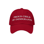 Red baseball cap with white embroidered PROUD CHILD OF IMMIGRANTS text, embodying resilience and pride; a statement piece for